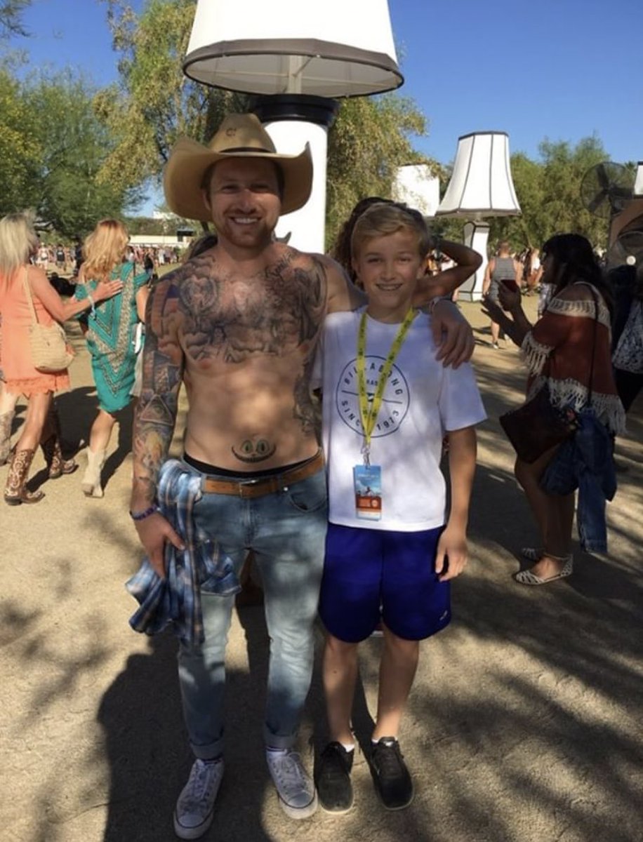 i’ve taken a picture with this guy 3 years in a row. i get to watch him grow up and he gets to see me fuck up my hair. 