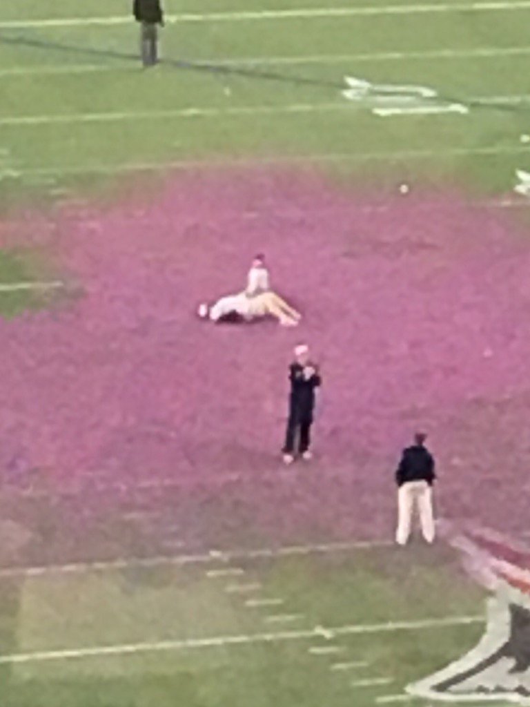Matt Patricia. On his back. On the field. In the confetti. With his kid. After his last game at Gillette. 