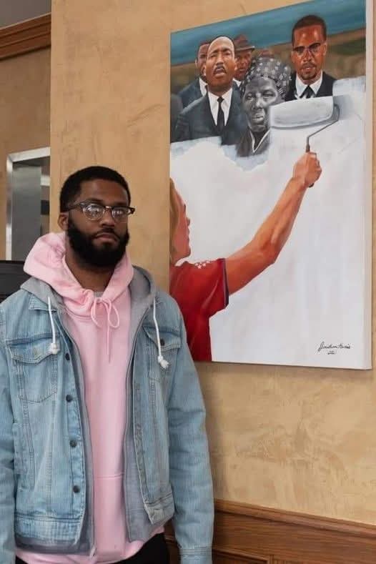 This is artist Jonathan Harris and his painting titled “Critical Race Theory." 