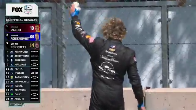 Santino Ferrucci chugs a beer from a fan after a podium finish at Road America. 